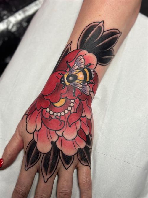 Pink peony tattoo