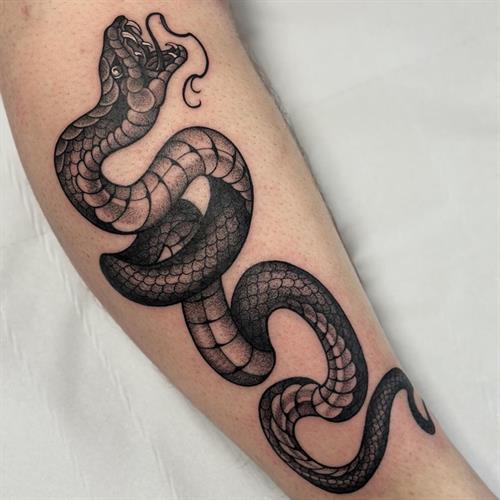 neotraditional curling snake pepper shading dotwork stipple black and grey tattoo