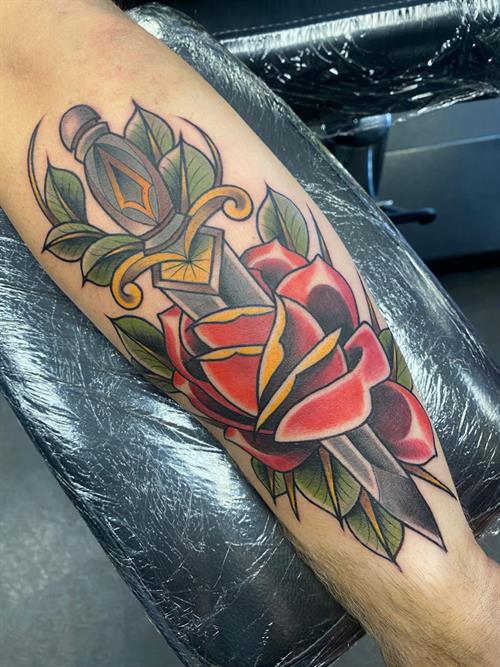 leafy rose dagger tattoo