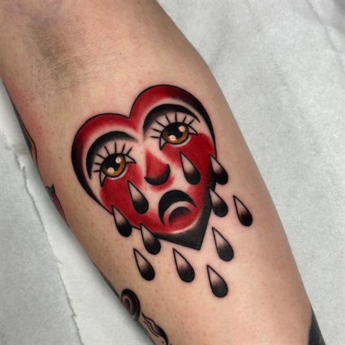 crying heart tattoo
